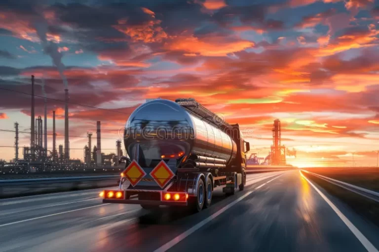 large tanker truck refinery sunset